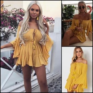 White Fox Boutique Gold Yellow Tassel Tie Ruffle Romper Jumper